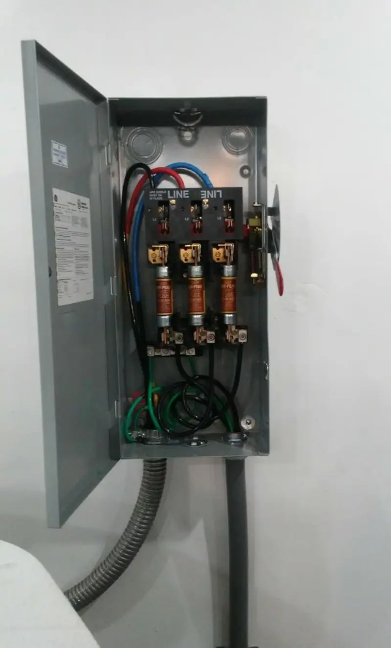 Three-phase disconnect switch installed for Smoke Detector Installation in Willis